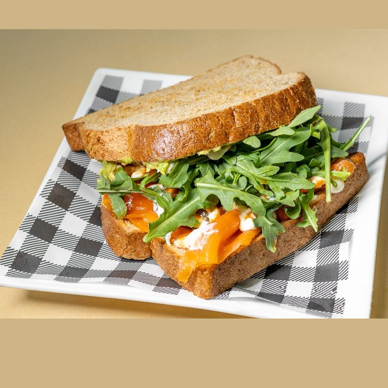 Smoked salmon, rocket, avocado and capers in toasted sourdough.